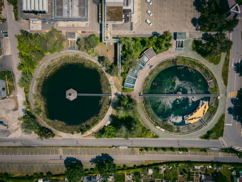 Industry illustration of wastewater-treatment basins, not the Beijing CDC site. Patrick Federi / Unsplash.