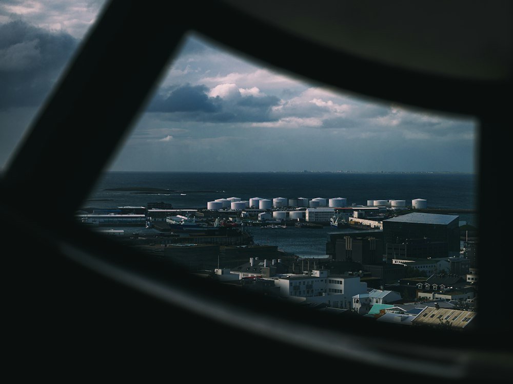 Industry illustration of port storage tanks, not a specific cryogenic project or compliance example. Yuheng Ouyang / Unsplash.