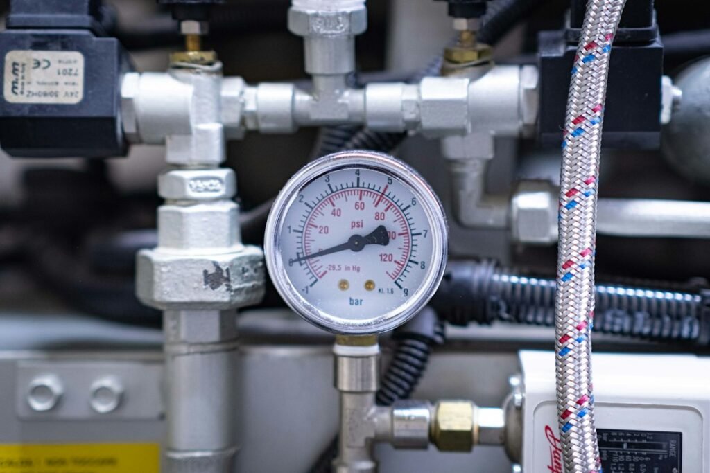 Pressure gauge and pipework illustration, not the Qingdao hydrogen project or specified equipment.