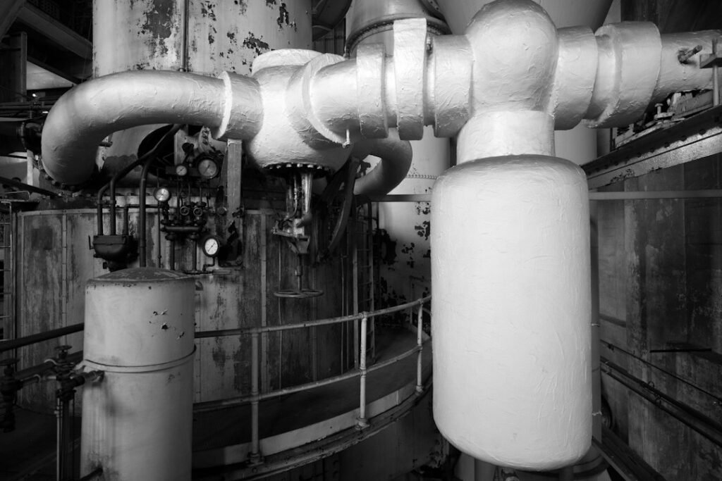 Illustrative industrial pipework for valve-supply context; not the copper valves or site covered by this contract.