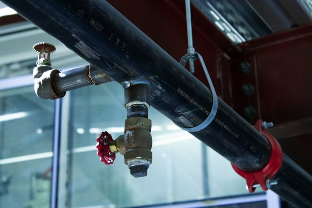 Illustrative fire-service pipework and valve; not equipment or a site image from this procurement.