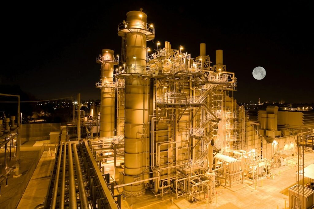 A nighttime industrial facility used as an engineering-sector illustration, not a Technip Energies project.